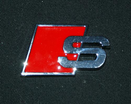 s_badge_black.jpg
